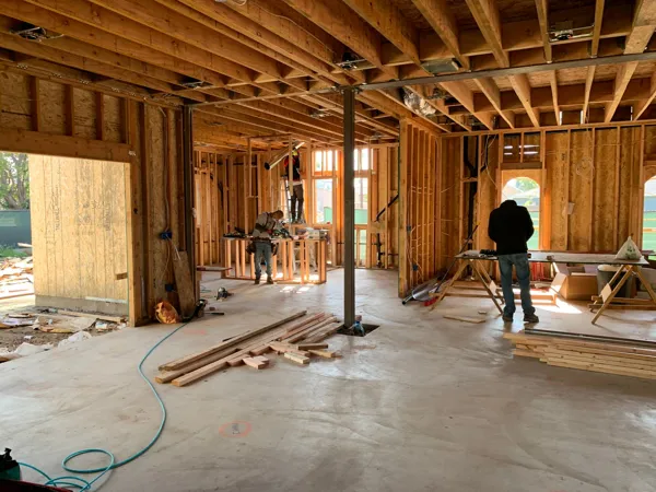Open wood-framed interior during construction