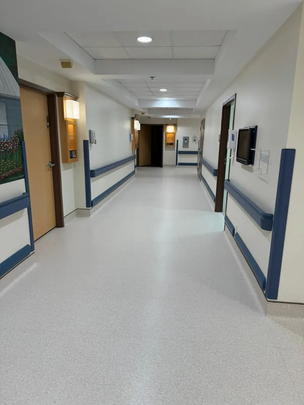 Finished corridor with new flooring and handrails